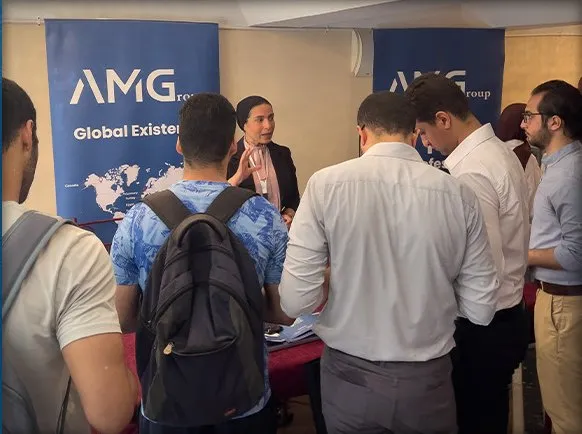 Students at the AMGroup stand at Cairo University